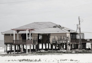 wind damage - spray foam can help prevent uplift to Irving roofs